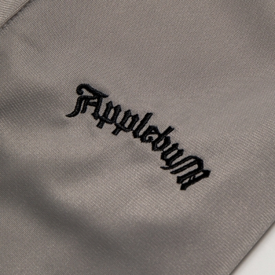 アップルバム パイピング トラック パンツ